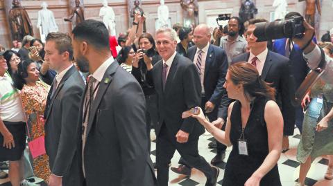 House Speaker McCarthy walks to the House floor on Capitol Hill ahead of debt ceiling vote in Washington