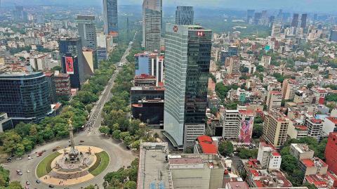 General view of Mexico City taken from a tower on La Reforma Avenue on July 31, 2023. (Photo by Daniel SLIM / AFP)