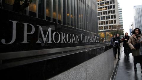 FILE PHOTO: A sign of JP Morgan Chase Bank is seen in front of their headquarters tower in Manhattan, New York, U.S., November 13, 2017. REUTERS/Amr Alfiky/File Photo-NARCH/NARCH30