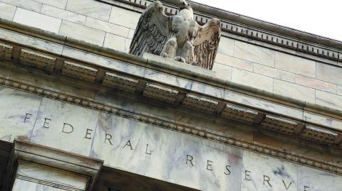 FILE PHOTO: An eagle tops the U.S. Federal Reserve building