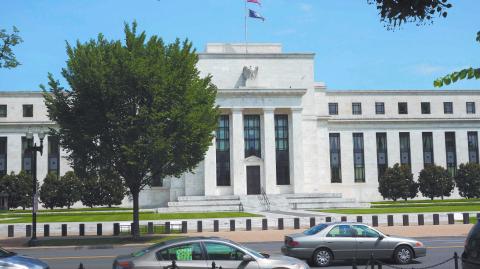 (FILES) This file photo taken on August 1, 2015 shows the US Federal Reserve building is seen in Washington, DC. Markets were already focusing more on what might happen in June as the Federal Reserve opened its two-day monetary policy meeting April 26, 2016 with no expectations of an interest rate change. With Chair Janet Yellen having tilted the Federal Open Market Committee to the dovish side in its March review, and the US economy in a lull, analysts say the group has room to wait and see what happens in the coming months. / AFP PHOTO / KAREN BLEIER