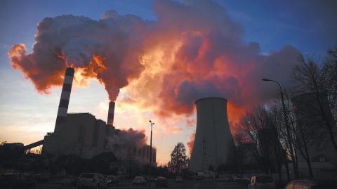 Smoke and steam billow from Belchatow Power Station, Europe