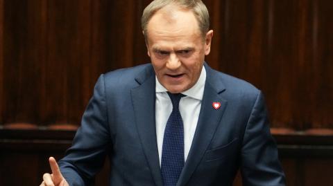 Leader of the Civic Coalition (KO) Donald Tusk gestures after the Parliament voted in favor of him becoming the Prime Minister, in Parliament, in Warsaw