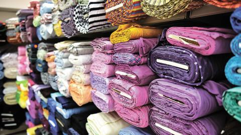 Rolls,Of,Fabric,And,Textiles,In,A,Factory,Shop.,Multi