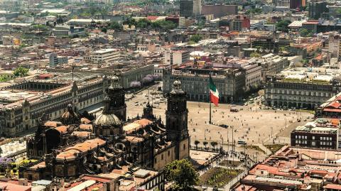 aerial view of Mexico City with zÛcalo, flag and most important buildings of mexico's government