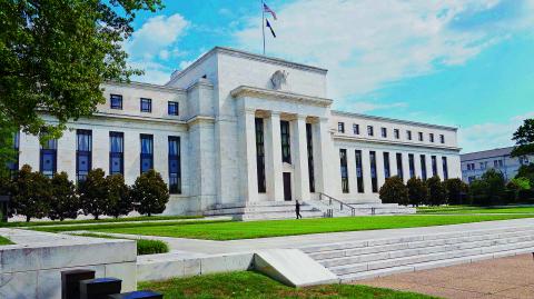 (FILES) This file photo taken on August 1, 2015 shows the US Federal Reserve building is seen August 1, 2015 in Washington, DC.US stocks rose early May 1, 2017 at the start of a heavy week of earnings and a Federal Reserve meeting, and as lawmakers reached a deal to avert a government shutdown.The Fed is not expected to raise the benchmark interest rate Wednesday after increasing in March. / AFP PHOTO / KAREN BLEIER