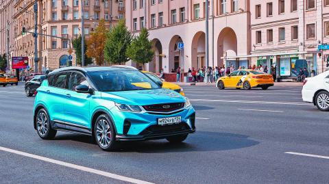 Blue Geely Coolray car in the flow of cars in the city. Chinese automobile. 09.23.2023 Moscow