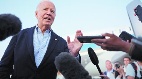 U.S. President Joe Biden speaks to journalists after visiting storm-damaged areas in the wake of Hurricane Helene, at Joint Base Andrews in Maryland, U.S., October 3, 2024. REUTERS/Tom Brenner