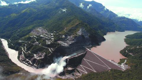 General view of the Hidroituango Hydroelectric Project, near the municipality of Ituango, Antioquia Department, Colombia, taken on October 13, 2022. The Hidroituango Hydroelectric Project is expected to start generating energy in November of this year after its construction was delayed for more than two years due to the collapse of one of the tunnels in April 2018. (Photo by Juan Pablo Pino / AFP)