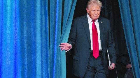 Republican presidential nominee and former U.S. President Donald Trump takes the stage for his election night rally at the Palm Beach County Convention Center in West Palm Beach, Florida, U.S., November 6, 2024. REUTERS/Brian Snyder