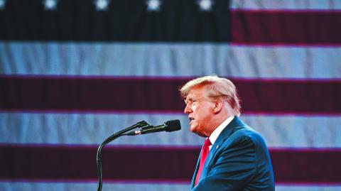 NATIONAL HARBOR, MD, USA- February 24, 2024: Donald Trump speaks at an event about his plan for defeating current President Joe Biden in November.