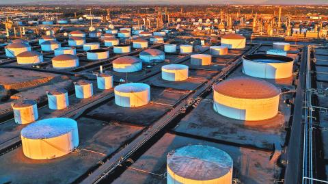FILE PHOTO: Storage tanks are seen at Marathon Petroleum's Los Angeles Refinery, which processes domestic & imported crude oil in Carson, California, U.S., March 11, 2022. Picture taken with a drone. REUTERS/Bing Guan/File Photo