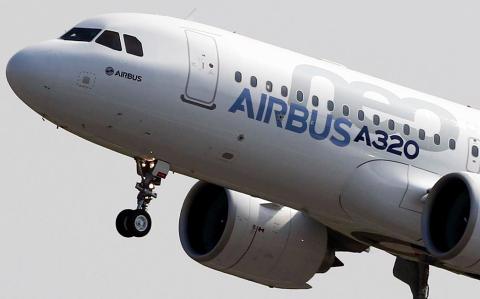 FILE PHOTO: The Airbus A320neo takes off during its first flight event in Colomiers near Toulouse, southwestern France