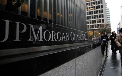 FILE PHOTO: A sign of JP Morgan Chase Bank is seen in front of their headquarters tower in Manhattan, New York, U.S., November 13, 2017. REUTERS/Amr Alfiky/File Photo-NARCH/NARCH30