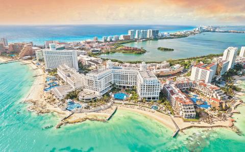 View of beautiful Hotels in the hotel zone of Cancun at sunset. Riviera Maya region in Quintana roo on Yucatan Peninsula