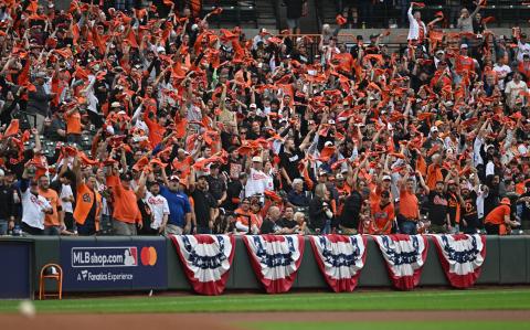 Oct 2, 2024; Baltimore, Maryland, USA; Baltimore Orioles fans wave rally towels before game two of the Wild Card round for the 2024 MLB Playoffs against the Kansas City Royals at Oriole Park at Camden Yards. Mandatory Credit: Tommy Gilligan-Imagn Images