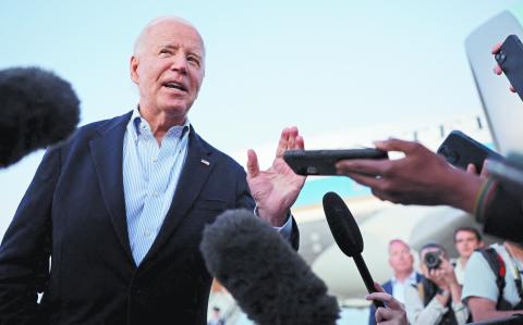 U.S. President Joe Biden speaks to journalists after visiting storm-damaged areas in the wake of Hurricane Helene, at Joint Base Andrews in Maryland, U.S., October 3, 2024. REUTERS/Tom Brenner