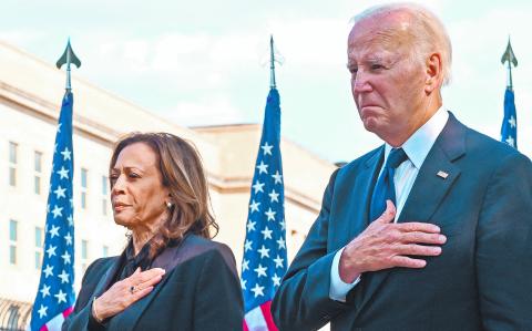 US President Joe Biden and US Vice President Kamala Harris participate in a wreath laying ceremony on the 23rd anniversary of the September 11 terror attack at the Pentagon in Arlington, Virginia on September 11, 2024. (Photo by ROBERTO SCHMIDT / AFP)