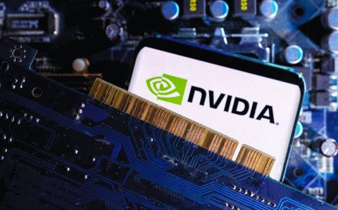 FILE PHOTO: A smartphone with a displayed NVIDIA logo is placed on a computer motherboard in this illustration taken March 6, 2023. REUTERS/Dado Ruvic/Illustration/File Photo