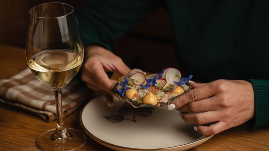 Tostada de langosta de Maximo Bistrot