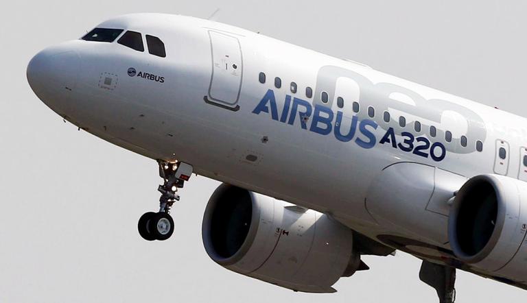 FILE PHOTO: The Airbus A320neo takes off during its first flight event in Colomiers near Toulouse, southwestern France
