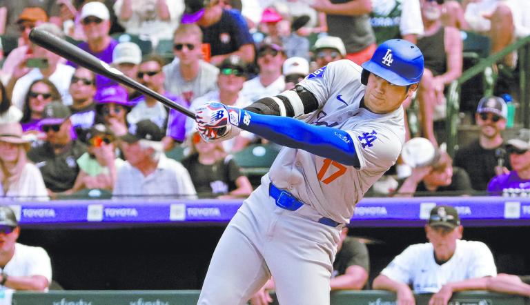 Sep 29, 2024; Denver, Colorado, USA; Los Angeles Dodgers two-way player Shohei Ohtani (17) swings the bat in the sixth inning against the Colorado Rockies at Coors Field. Mandatory Credit: Ron Chenoy-Imagn Images