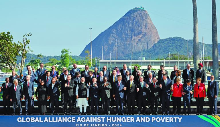 Leaders attending the launch of the Global Alliance Against Hunger and Poverty pose for a group photo after the first session of the G20 Leaders' Meeting in Rio de Janeiro, Brazil, on November 18, 2024. (Photo by Ludovic MARIN / AFP)