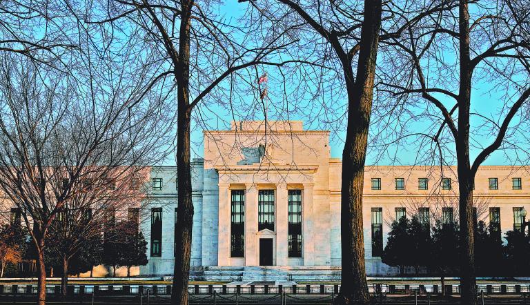 FILE PHOTO: The Federal Reserve building is seen in Washington, U.S., January 26, 2022. REUTERS/Joshua Roberts/File Photo