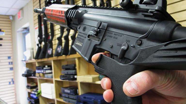 Semiautomatic rifle - FILE - In this Feb. 1, 2013, file photo, an employee of North Raleigh Guns demonstrates how a "bump" stock works at the Raleigh, N.C., shop. The gunman who unleashed hundreds of rounds of gunfire on a crowd of concertgoers in Las Vegas on Monday, Oct. 2, 2017, attached what is called a "bump-stock" to two of his weapons, in effect converting semiautomatic firearms into fully automatic ones. (AP Photo/Allen Breed, File) - FEB. 1, 2013, FILE PHOTO