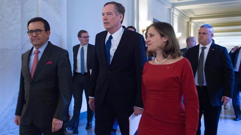 United States Trade Representative Robert Lighthizer (C), Canadian Foreign Affairs minister Chrystia Freeland (L), and Mexican Secretary of Economy Ildefonso Guajardo Villarreal walk out of a press conference at the conclusion of the fourth round of negotiations for a new North American Free Trade Agreement (NAFTA) at the General Services Administration headquarters in Washington, DC, on October 17, 2017.Canada, the United States and Mexico on October 17 said significant disagreements remained in talks to overhaul a landmark regional trade pact and extended negotiations into 2018. / AFP PHOTO / ANDREW CABALLERO-REYNOLDS