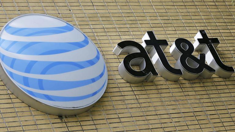 **ATTENTION SWAYNE HALL**This photo taken Thursday, Oct. 12, 2017, shows an AT&T sign, in Miami. (AP Photo/Alan Diaz)