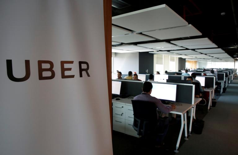 FILE PHOTO: Employees work inside Uber COE in Cairo - NARCH/NARCH30