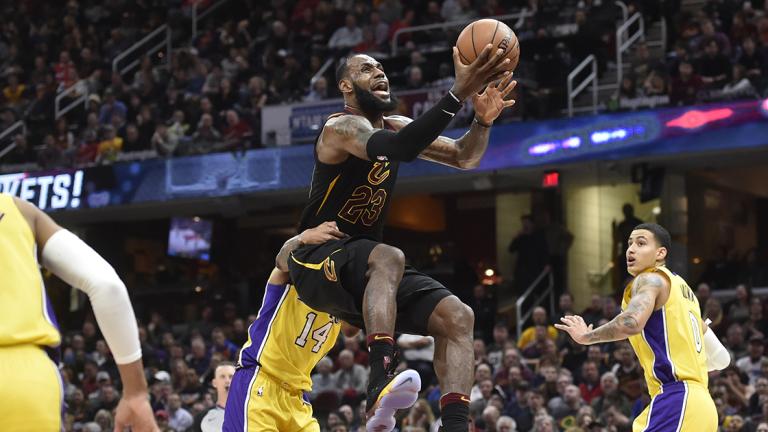 NBA: Los Angeles Lakers at Cleveland Cavaliers - Dec 14, 2017; Cleveland, OH, USA; Cleveland Cavaliers forward LeBron James (23) is fouled by Los Angeles Lakers forward Brandon Ingram (14) while driving to the basket in the third quarter at Quicken Loans Arena. Mandatory Credit: David Richard-USA TODAY Sports