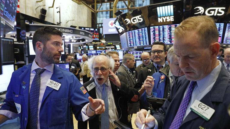 Traders work on the floor of the New York Stock Exchange ahead of the opening bell in New York - Traders work on the floor of the New York Stock Exchange ahead of the opening bell in New York, U.S., February 7, 2018. REUTERS/Brendan Mcdermid