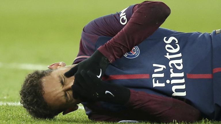 FILE PHOTO: Ligue 1 - Paris St Germain vs Olympique de Marseille - FILE PHOTO: Soccer Football - Ligue 1 - Paris St Germain vs Olympique de Marseille - Parc des Princes, Paris, France - February 25, 2018   Paris Saint-Germainâ€™s Neymar lies on the pitch after sustaining an injury  Picture taken February 25, 2018.  REUTERS/Stephane Mahe/File Photo - NARCH/NARCH30