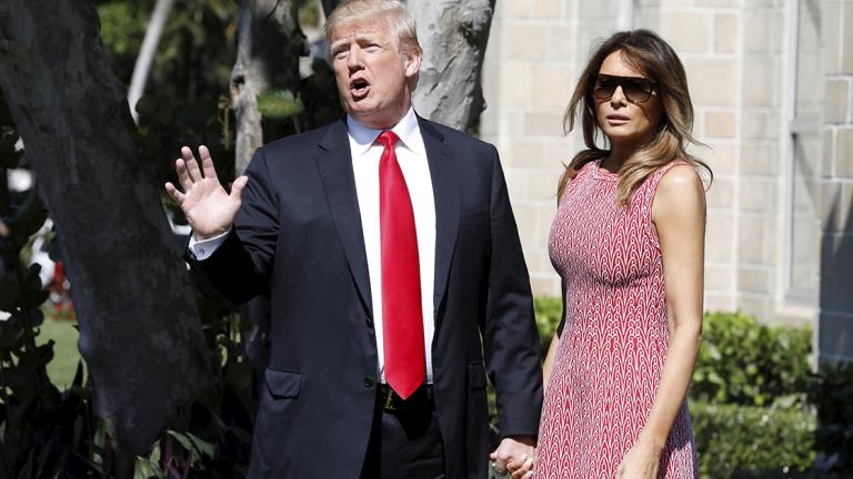 President Donald Trump and first lady Melania Trump arrive for the Easter service at Bethesda-by-the-Sea Episcopal Church in Palm Beach - U.S. President Donald Trump talks to reporters about DACA as he arrives with first lady Melania Trump for the Easter service at Bethesda-by-the-Sea Episcopal Church in Palm Beach, Florida, U.S., April 1, 2018. REUTERS/Yuri Gripas