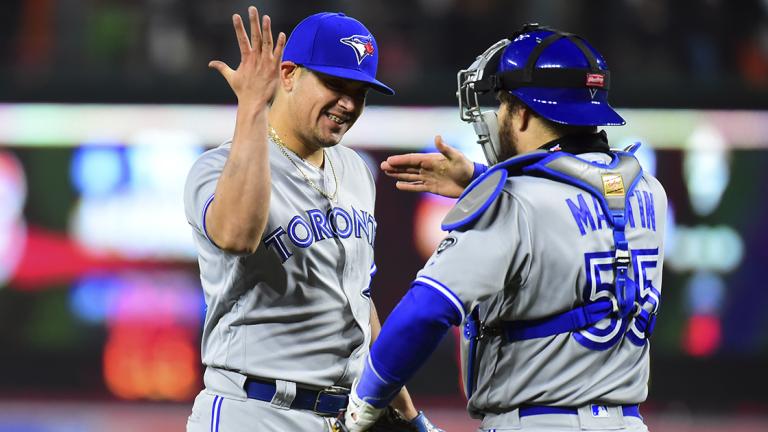 MLB: Toronto Blue Jays at Baltimore Orioles - Apr 10, 2018; Baltimore, MD, USA; Toronto Blue Jays pitcher Roberto Osuna (54) celebrates with catcher Russell Martin (55) after beating the Baltimore Orioles 2-1 at Oriole Park at Camden Yards. Mandatory Credit: Evan Habeeb-USA TODAY Sports