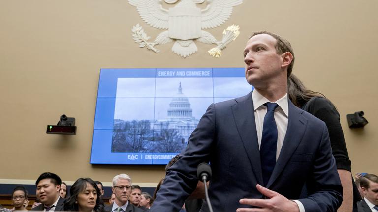 Mark Zuckerberg - Facebook CEO Mark Zuckerberg arrives to testify before a House Energy and Commerce hearing on Capitol Hill in Washington, Wednesday, April 11, 2018, about the use of Facebook data to target American voters in the 2016 election and data privacy. (AP Photo/Andrew Harnik)