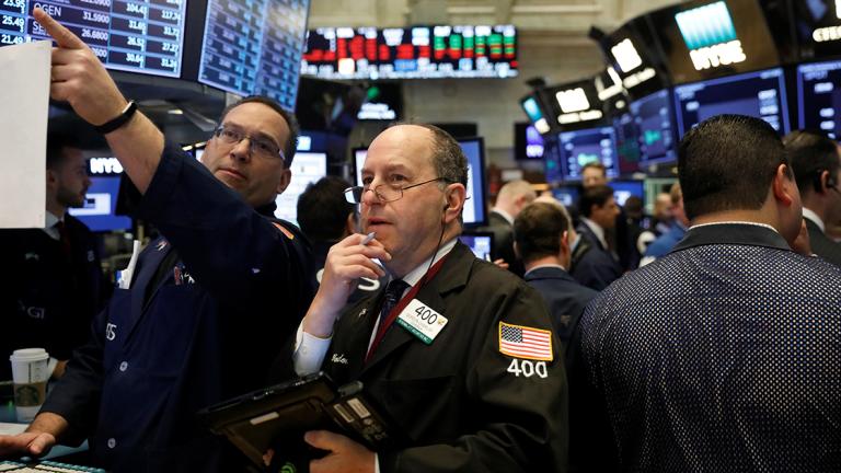 Traders work on the floor of the New York Stock Exchange shortly after the opening bell in New York - Traders work on the floor of the New York Stock Exchange shortly after the opening bell in New York, U.S., April 3, 2018.  REUTERS/Lucas Jackson