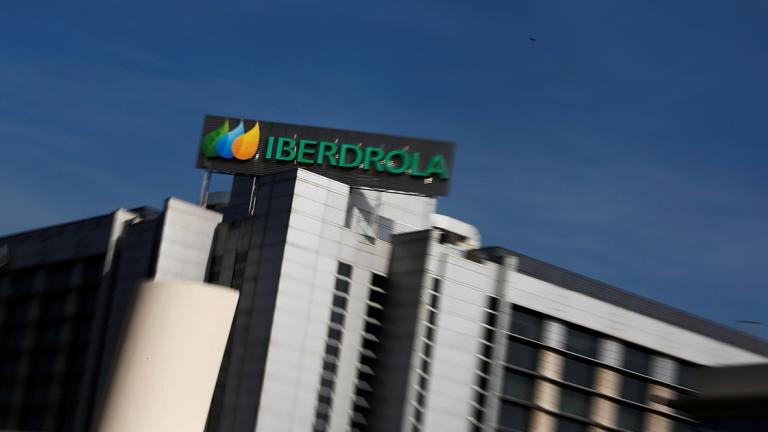 FILE PHOTO: The logo of Spanish power company Iberdrola is seen on top of Iberdrola