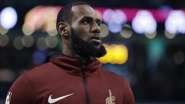 Brad Stevens, LeBron James - Cleveland Cavaliers forward LeBron James warms up before Game 2 of the team