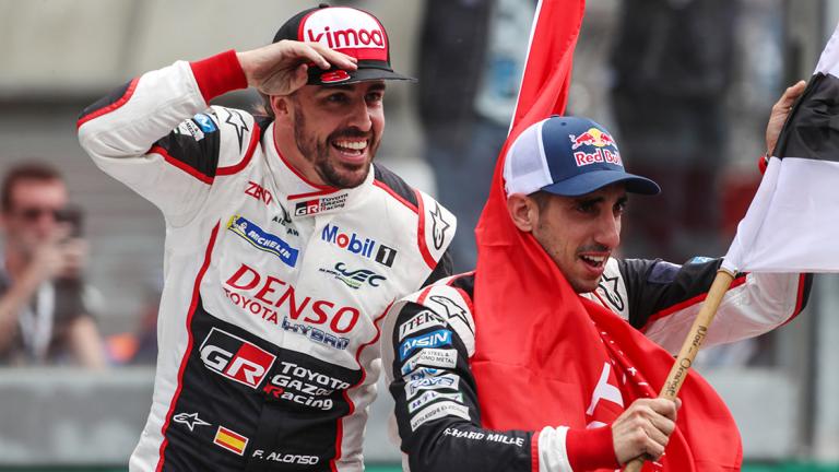 Sebastien Buemi - Swiss driver Sebastien Buemi (R) from the #8 Toyota Gazoo Racing car waves to fans together with team-mate Fernando Alonso after winning the classic 24 hours of Le Mans race on June 17, 2018 // Dutch Photo Agency/Red Bull Content Pool // For more content, pictures and videos like this please go to www.redbullcontentpool.com - This image may only be used for editorial purpose in one-time publications and strictly limited to the purpose of use stated on www.redbullcontentpool.com. It must not be altered or modified. Publication must be accompanied by the official photo credit.