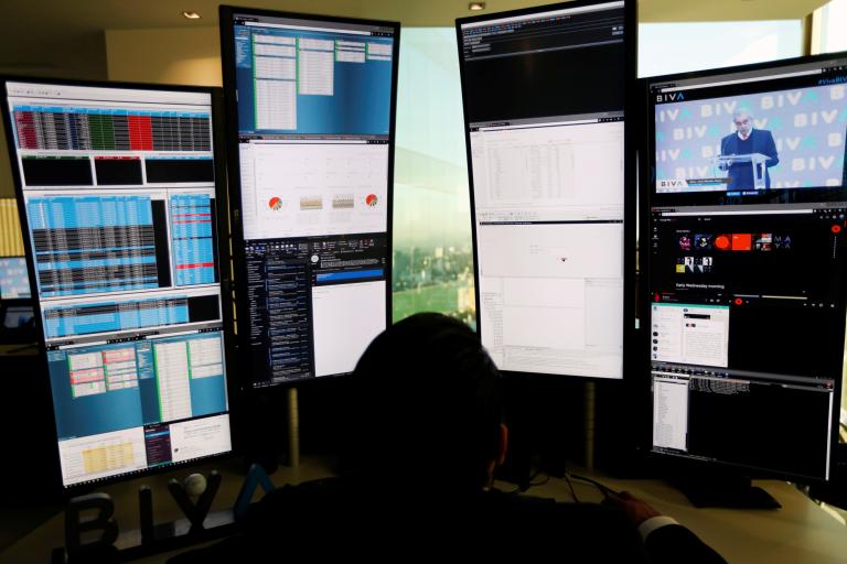 An employee works at the Bolsa Institucional de Valores (BIVA), Mexico's second stock exchange, during the launch of operations to compete with the Mexican Stock Exchange, in Mexico City