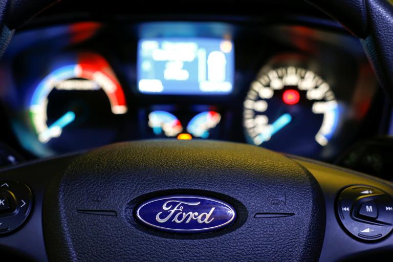 The cockpit and steering wheel of a Streetscooter WORK XL electric van based on a Ford Transit is pictured at Ford