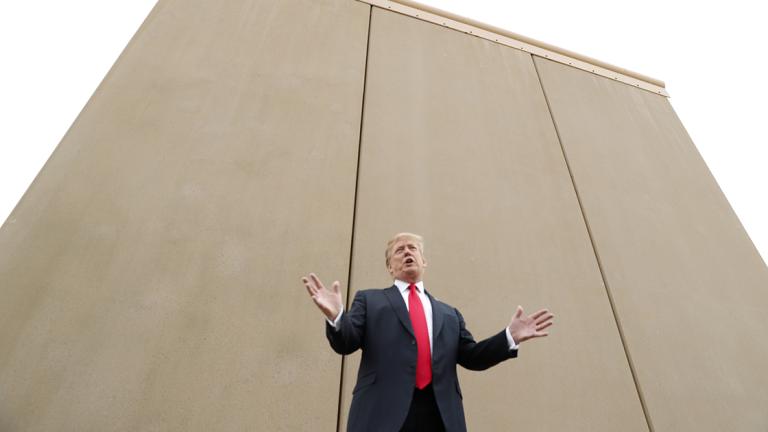 U.S. President Trump participates in tour of U.S.-Mexico border wall prototypes near Otay Mesa Port of Entry in San Diego, California - U.S. President Donald Trump speaks while participating in a tour of U.S.-Mexico border wall prototypes near the Otay Mesa Port of Entry in San Diego, California. U.S., March 13, 2018. REUTERS/Kevin Lamarque