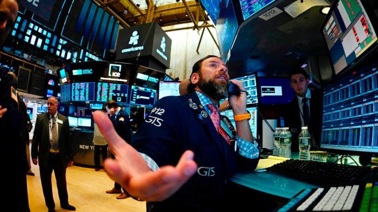 Traders work after the opening bell at the New York Stock Exchange (NYSE) on August 15, 2019 at Wall Street in New York City. - Wall Street stocks opened higher Thursday following mixed US economic data, bouncing modestly after the Dow suffered its worst session of the year. About five minutes into trading, the Dow Jones Industrial Average was at 25,531.36, up 0.2 percent. The broad-based S&P 500 also added 0.2 percent at 2,846.22, along with the tech-rich Nasdaq Composite Index, which stood at 2,846.22. (Photo by Johannes EISELE / AFP)