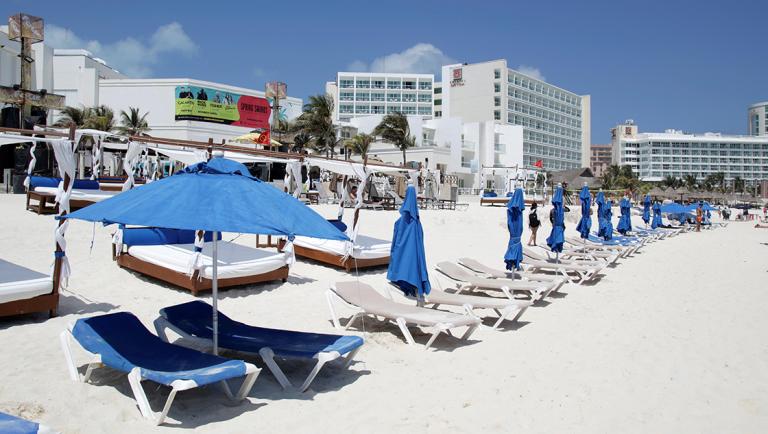 A general view shows empty sun chairs along a beach during the coronavirus disease (COVID-19) outbreak in Cancun, Mexico March 17, 2020. Picture taken March 17, 2020. REUTERS/Jorge Delgado