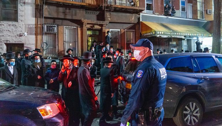 Jewish Hasidic community members gather for a funeral procession, during lockdown amid the coronavirus disease (COVID-19) outbreak, in Williamsburg