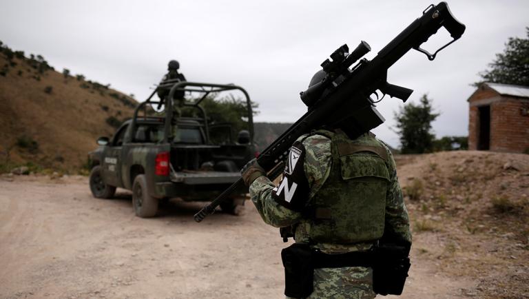 Soldiers assigned to the National Guard are seen while giving protection for the caravan of relatives on their journey to bury Miller-Lebaron, Langford and their children in Bavispe