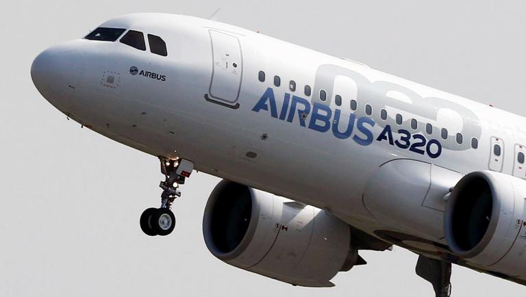 FILE PHOTO: The Airbus A320neo takes off during its first flight event in Colomiers near Toulouse, southwestern France